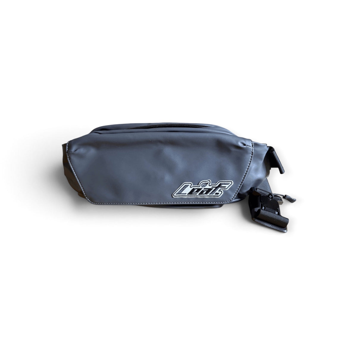 Leaf matte black water-resistant waist pack with an embroidered brand patch and adjustable nylon strap.